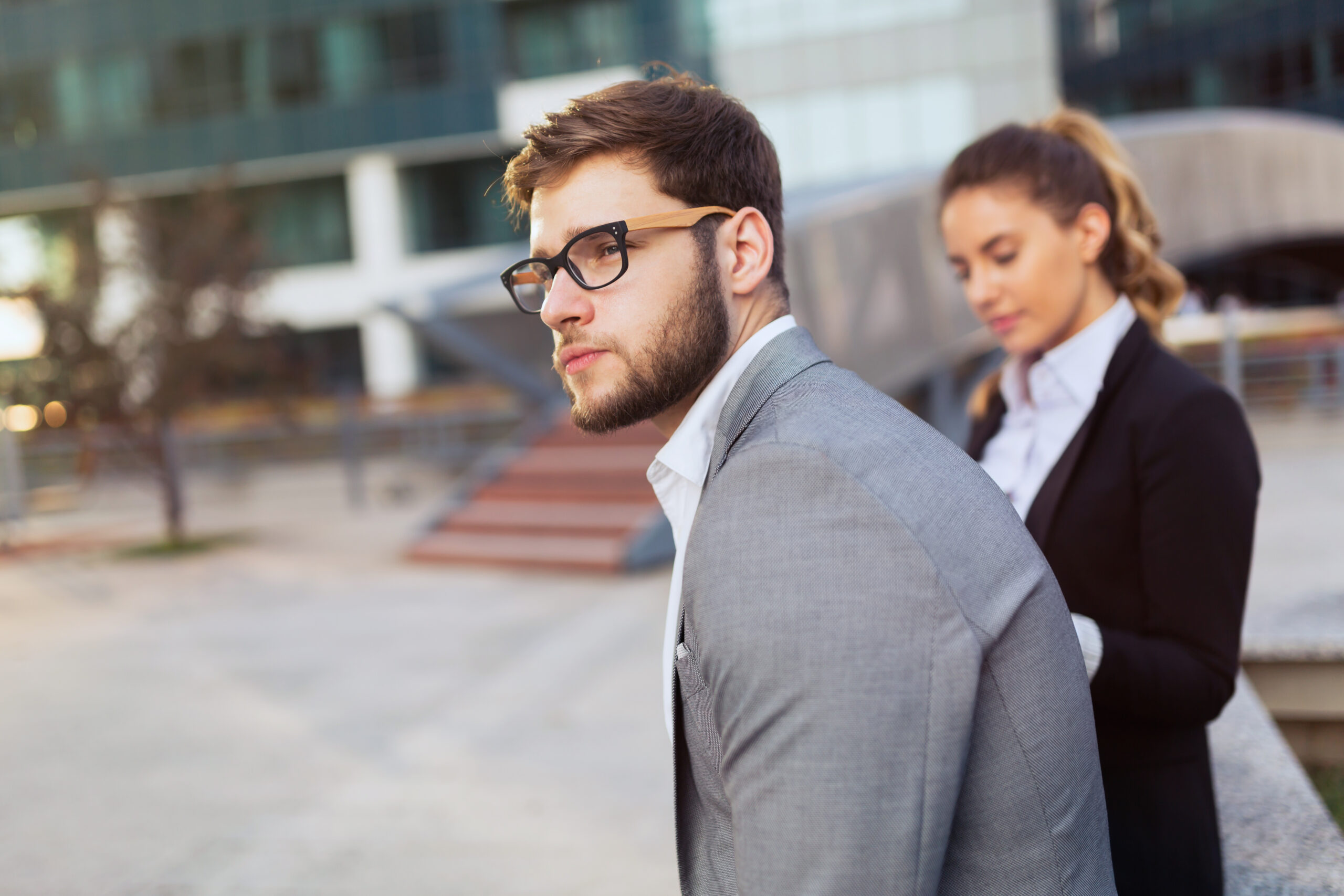 A direct marketing team waiting for potential customers outside.